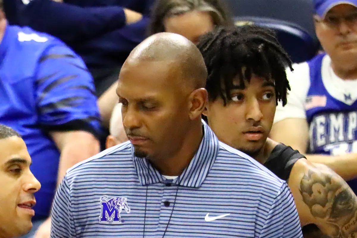 Penny Hardaway on the Memphis Tigers sideline in February 2025, wearing a striped Memphis polo